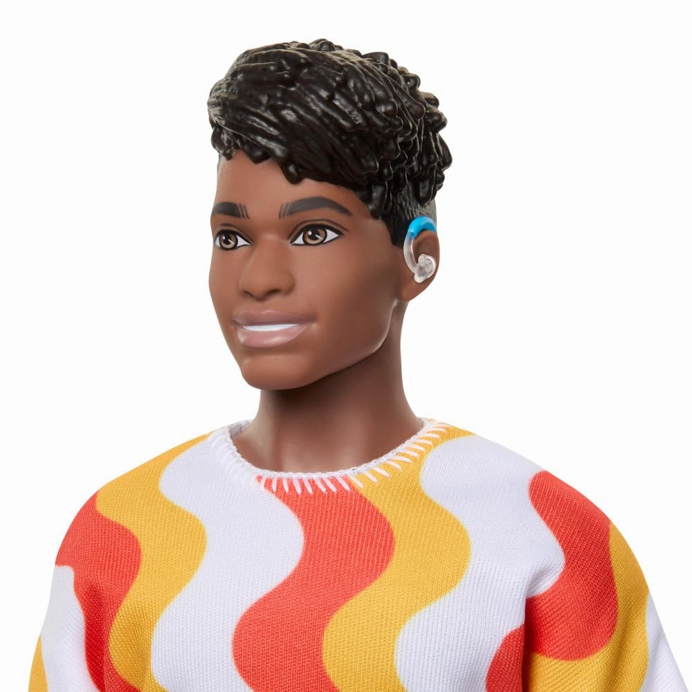 Barbie Fashionistas Ken Doll #220 with Behind-the-Ear Hearing Aids & Broad Body Wearing a Removable Orange Patterned Shirt, Shorts & Jelly Sandals